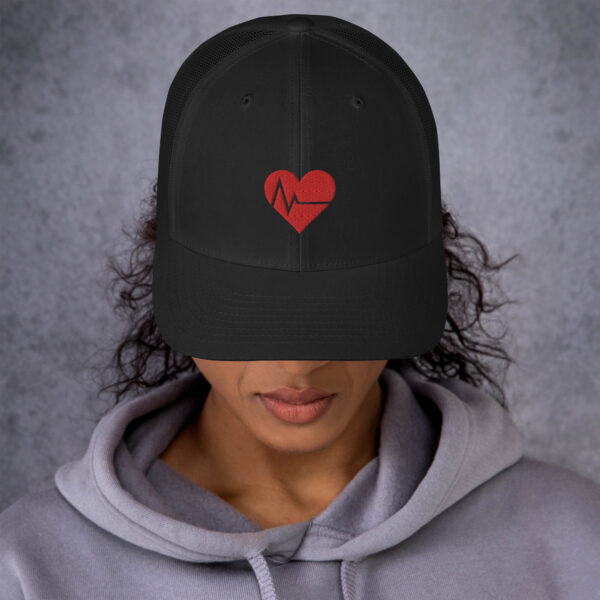 LOVE IS JADED Trucker Cap